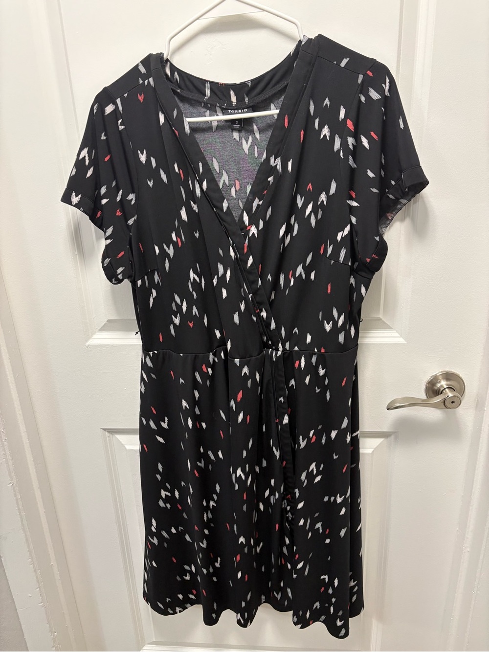 TORRID Black Printed Short Sleeve Wrap Dress with Red & White Accents.